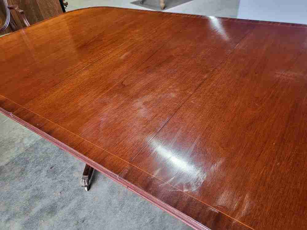 Antique repro mahogany twin pedestal extending D end dining table