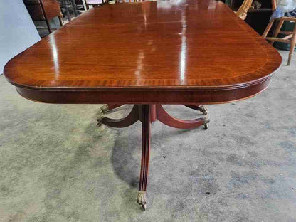 Antique repro mahogany twin pedestal extending D end dining table