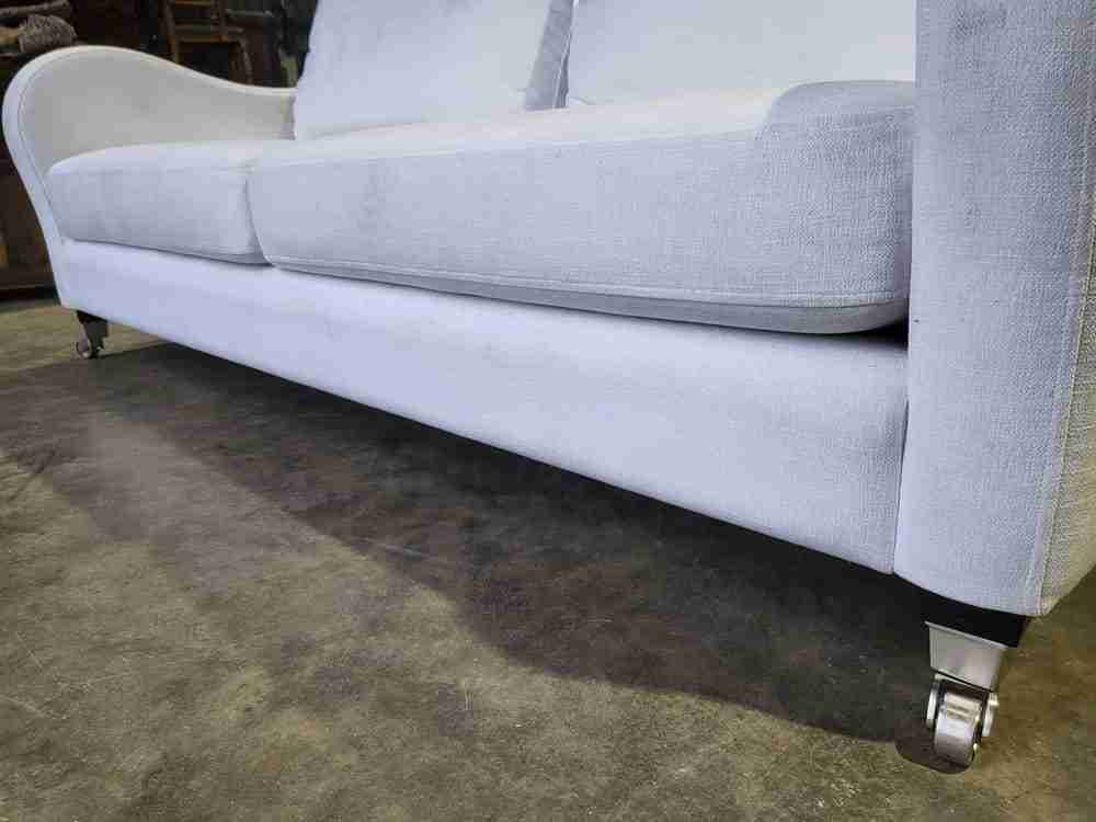 Sofa 2 seat feather cushions castors curved sides oatmeal white fabric