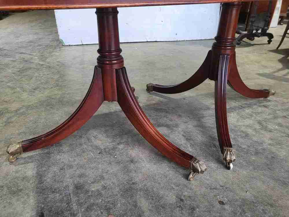 Antique repro mahogany twin pedestal extending D end dining table