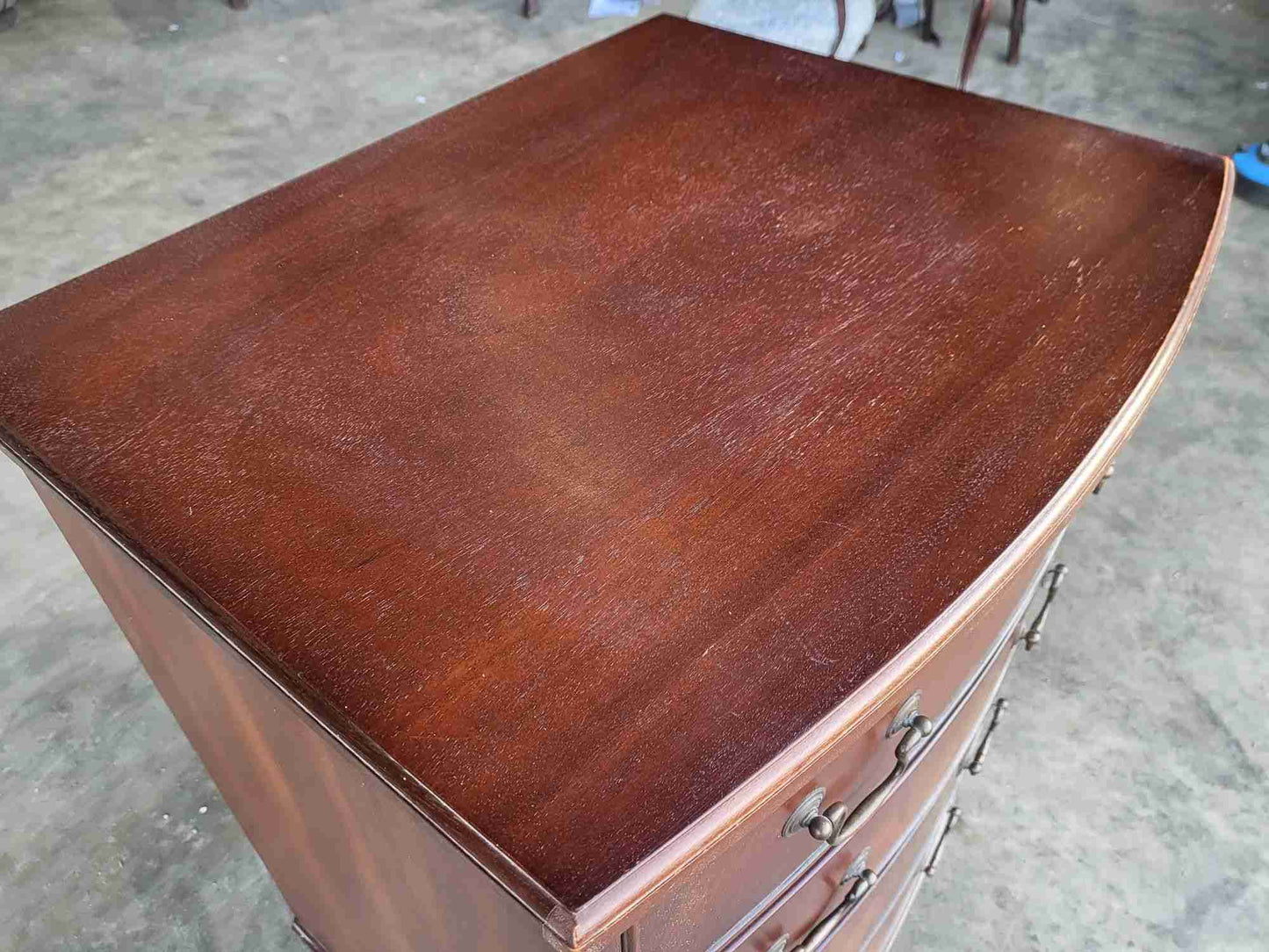 Antique repro small bow front chest of 4 drawers