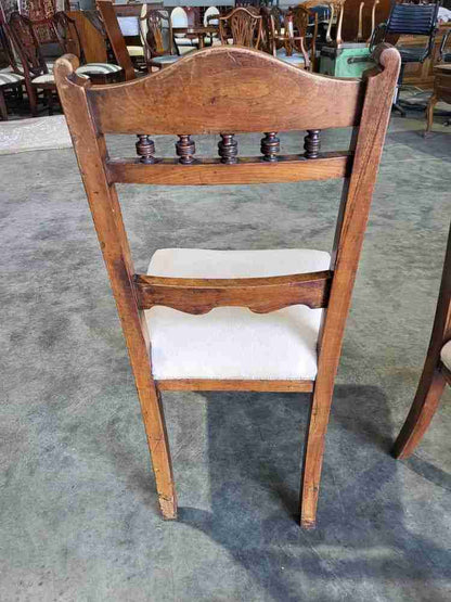 Four antique Victorian carved bar back dining chairs cream
