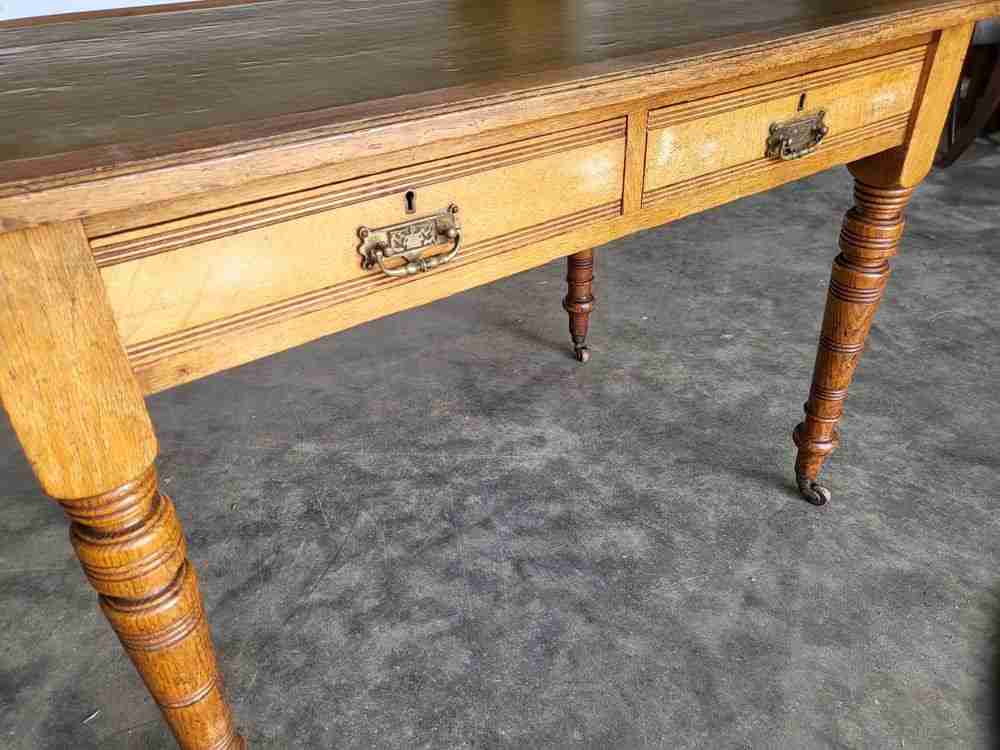 Antique Edwardian 2 drawer writing table desk turned legs castors