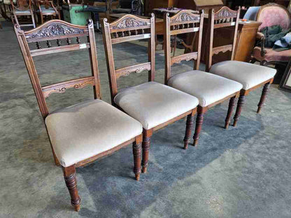 Four antique Victorian carved bar back dining chairs cream