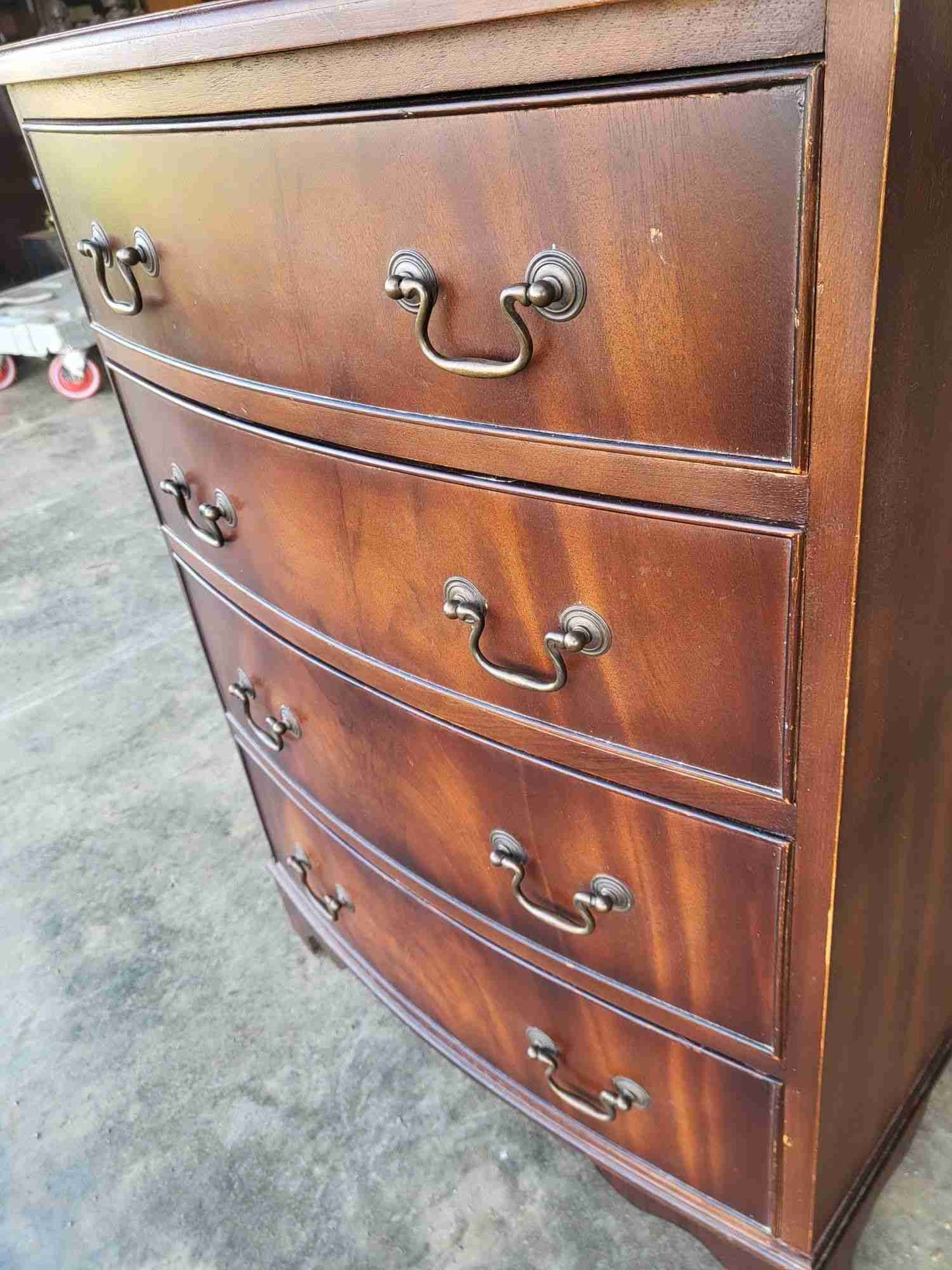 Antique repro small bow front chest of 4 drawers