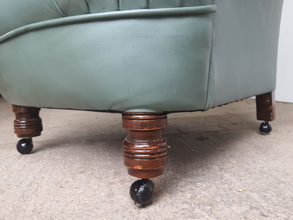 Antique Wing Back Green Leather Armchair Wood Legs Castors