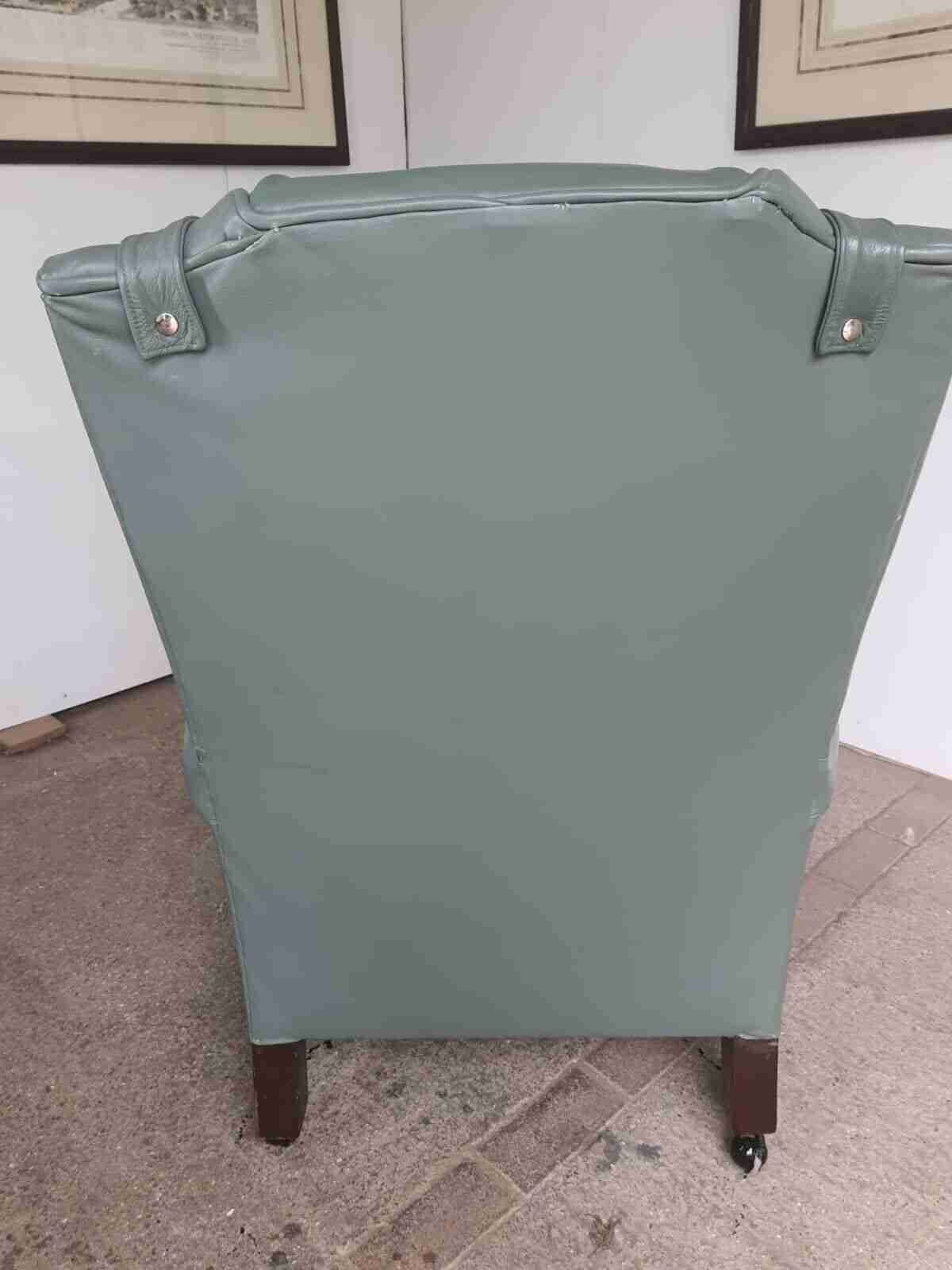 Antique Wing Back Green Leather Armchair Wood Legs Castors