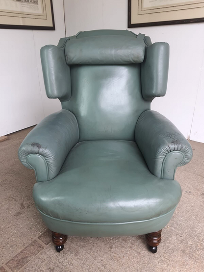 Antique Wing Back Green Leather Armchair Wood Legs Castors