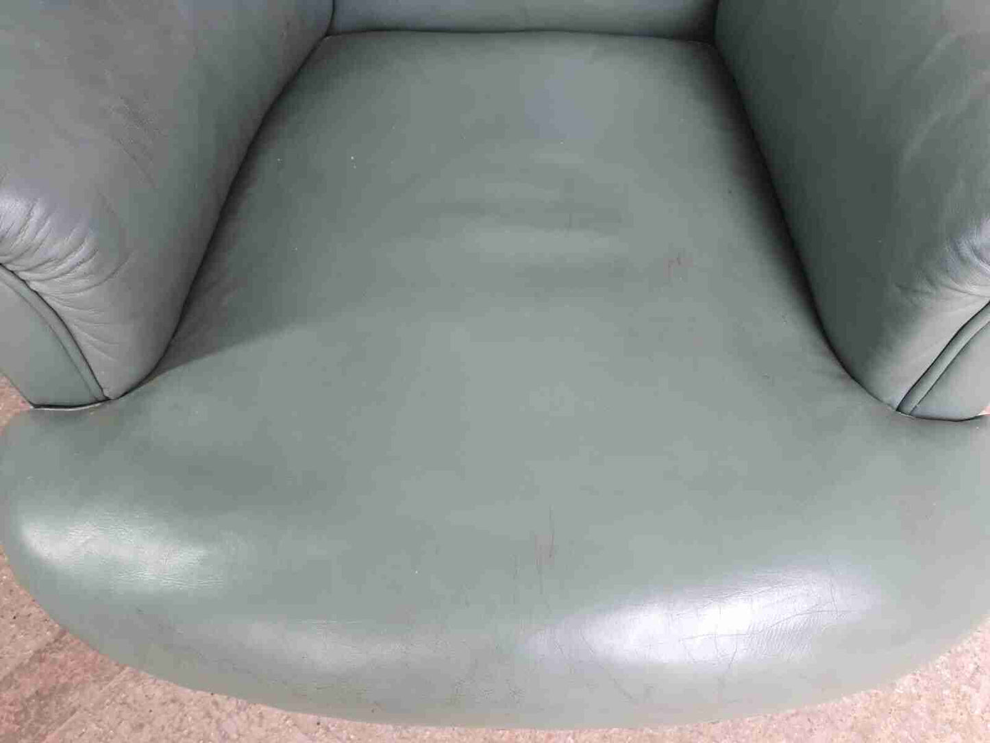 Antique Wing Back Green Leather Armchair Wood Legs Castors