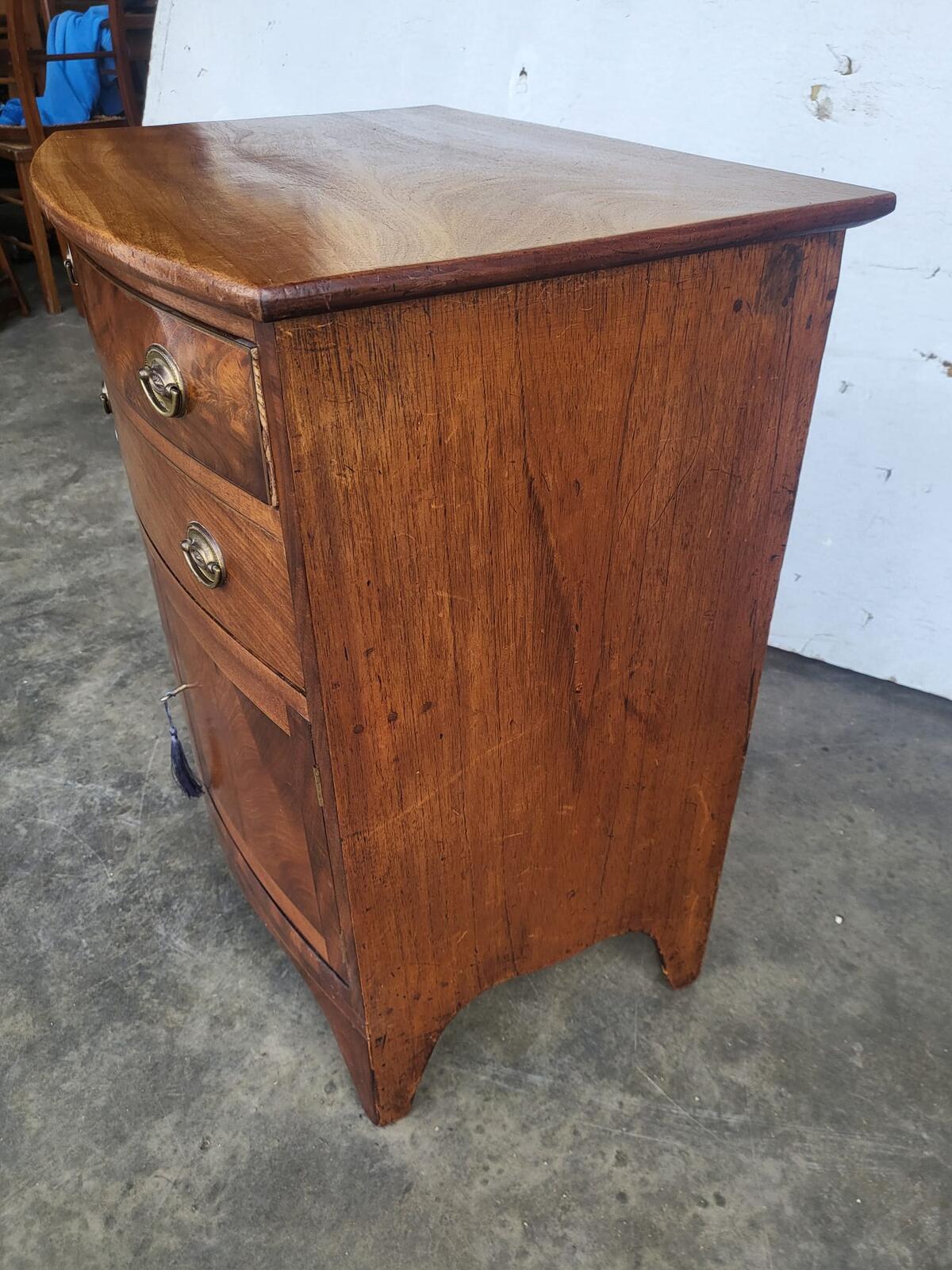 Antique Edwardian small bow front cabinet drawers splayed legs