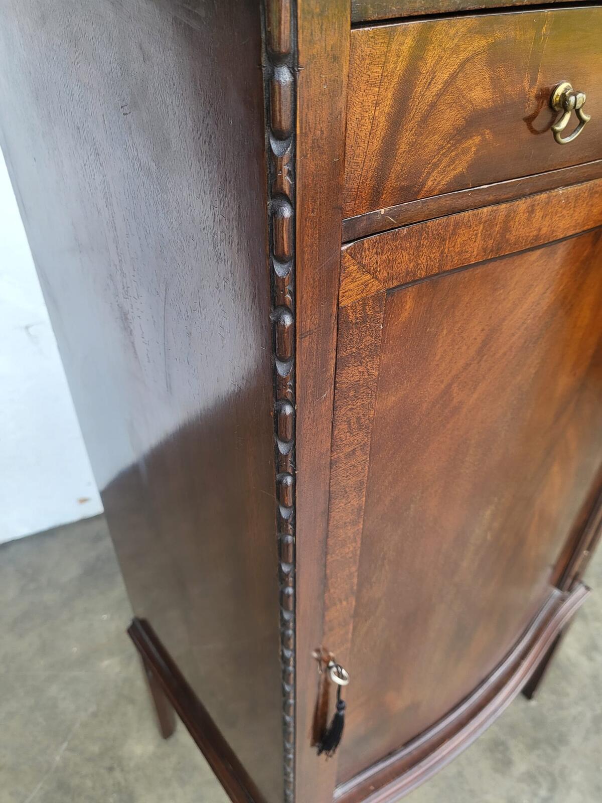 Antique mahogany tall bow front cabinet drawer legs