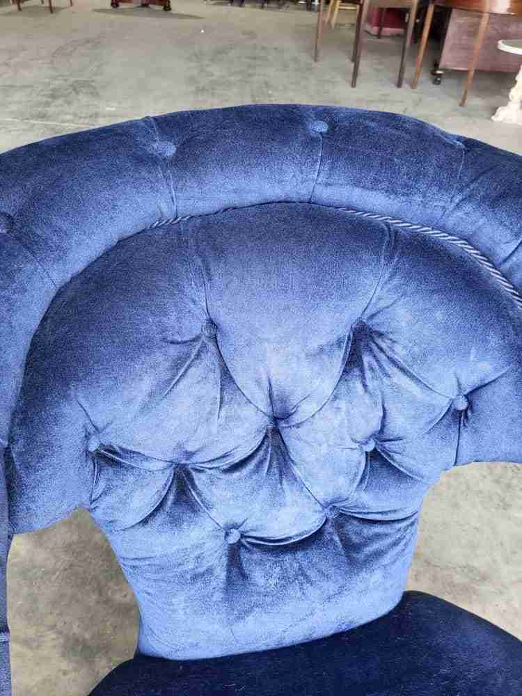 Antique Victorian curved button back blue armchair carved cabriole legs castors