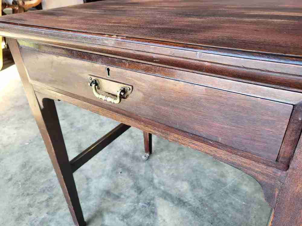 Antique Edwardian single pedestal desk 4 drawers tapered legs castors