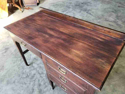 Antique Edwardian single pedestal desk 4 drawers tapered legs castors