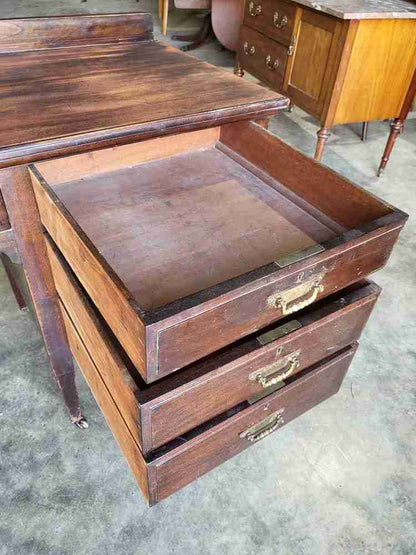 Antique Edwardian single pedestal desk 4 drawers tapered legs castors