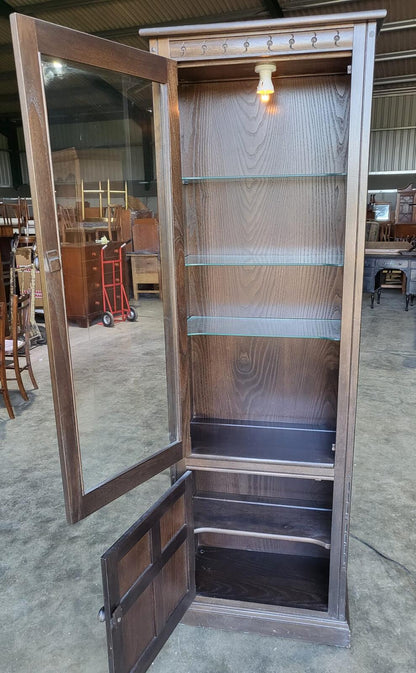 Dark Ercol tall glazed cabinet cupboard bookcase shelves
