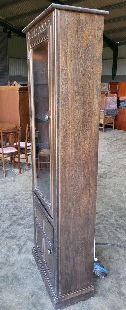 Dark Ercol tall glazed cabinet cupboard bookcase shelves