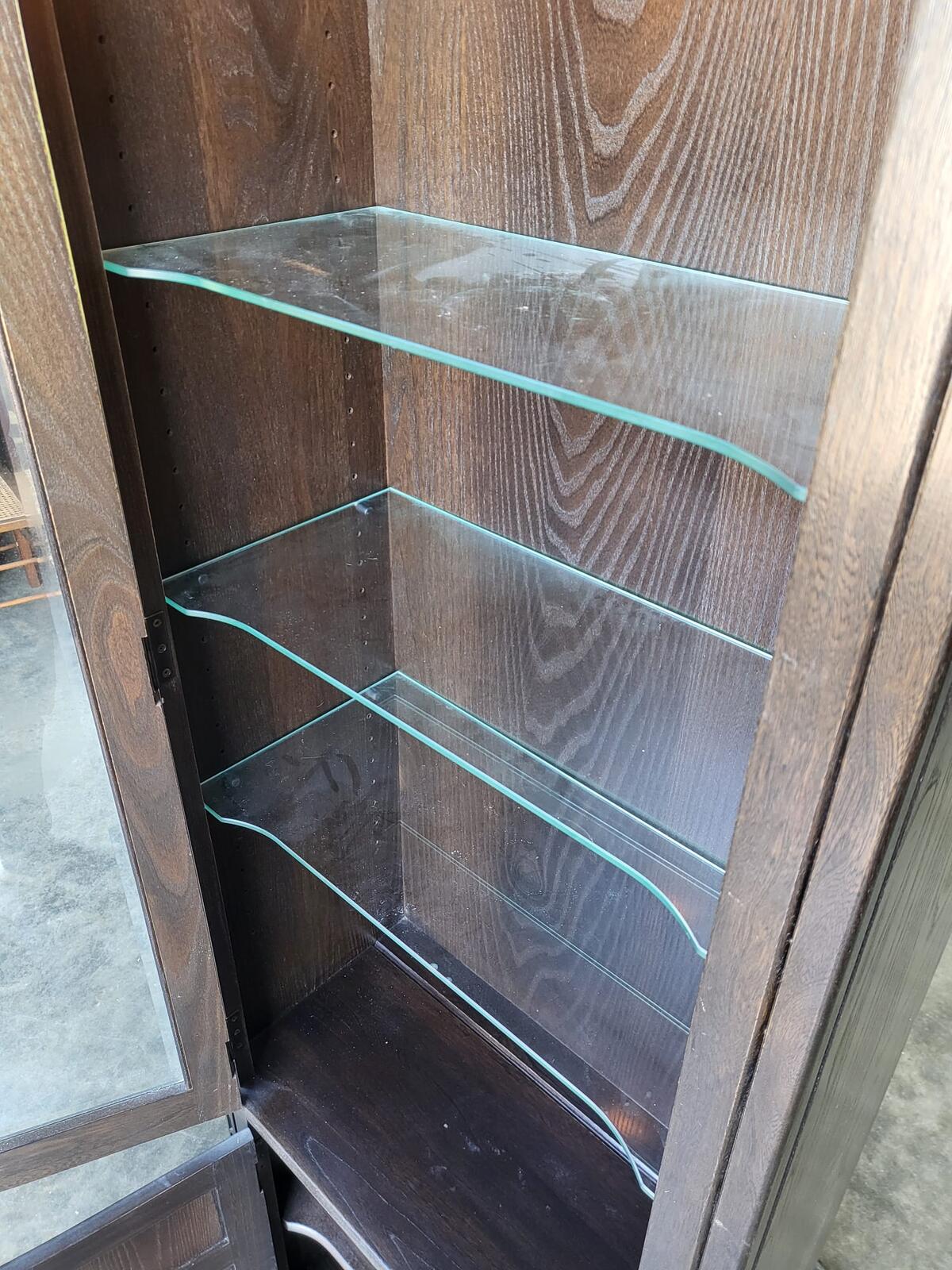 Dark Ercol tall glazed cabinet cupboard bookcase shelves