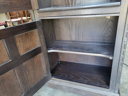 Dark Ercol tall glazed cabinet cupboard bookcase shelves