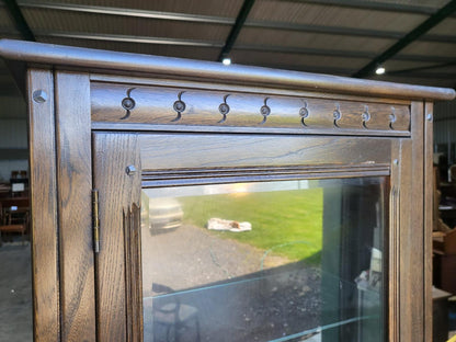 Dark Ercol tall glazed cabinet cupboard bookcase shelves