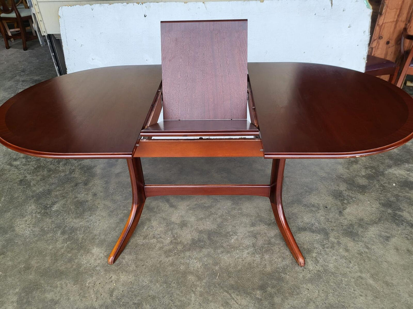 1970's extending dark teak pedestal dining table seat 6/8 + 4 chairs