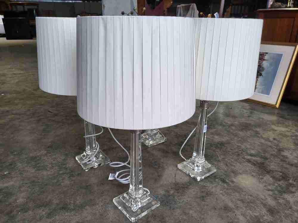 Pair glass single column table lamps pleated white shades