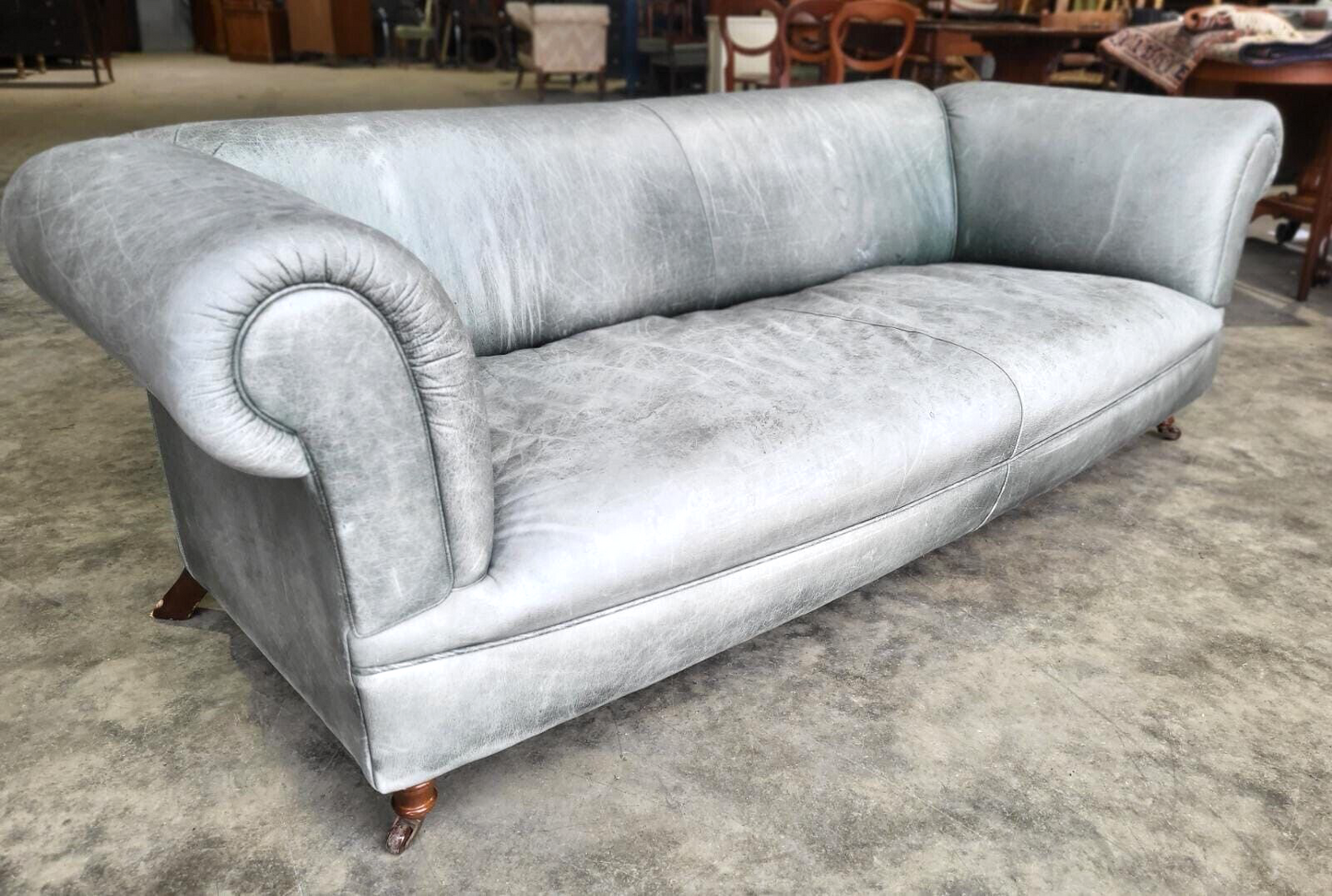 Leather Chesterfield Sofa Swept Arms Wood Legs Castors Settee