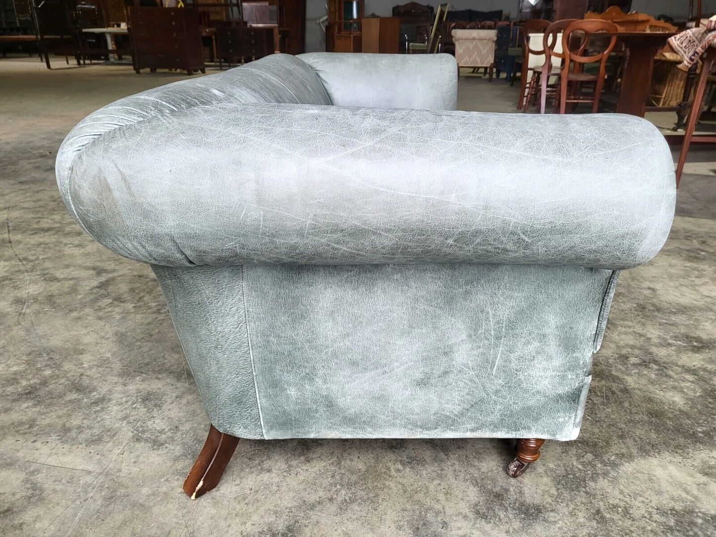 Leather Chesterfield Sofa Swept Arms Wood Legs Castors Settee