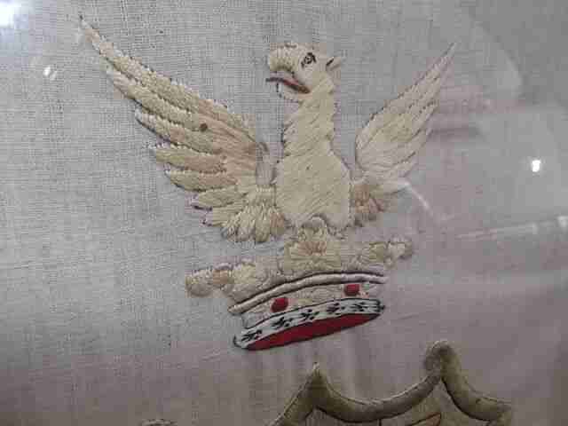 Antique fire screen - Oak fire screen with embroidered linen coat of arms