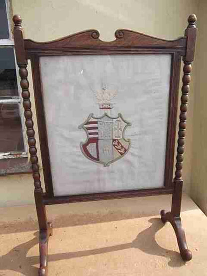 Antique fire screen - Oak fire screen with embroidered linen coat of arms