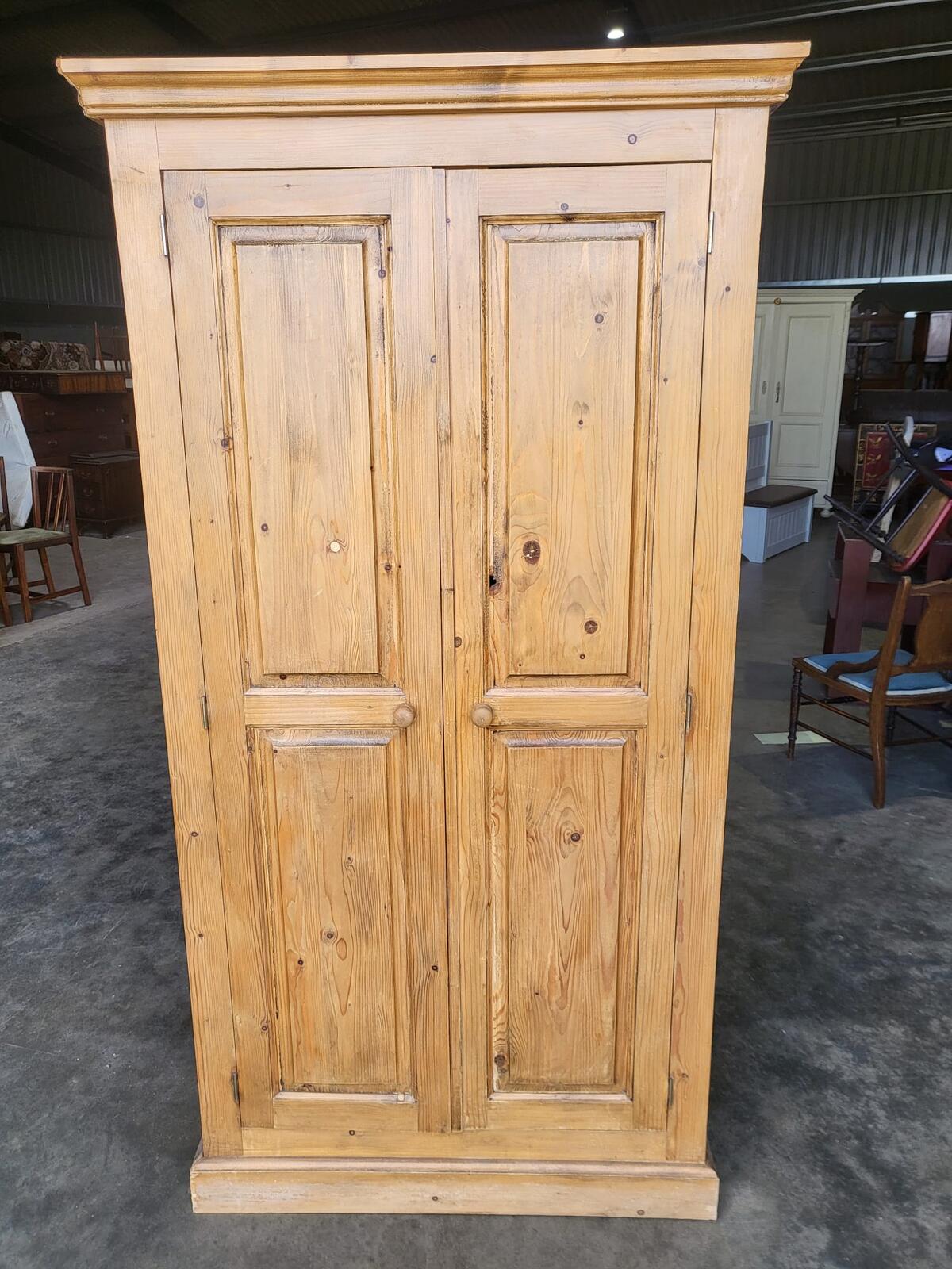 Pine panelled 2 door wardrobe hanging rail bedroom