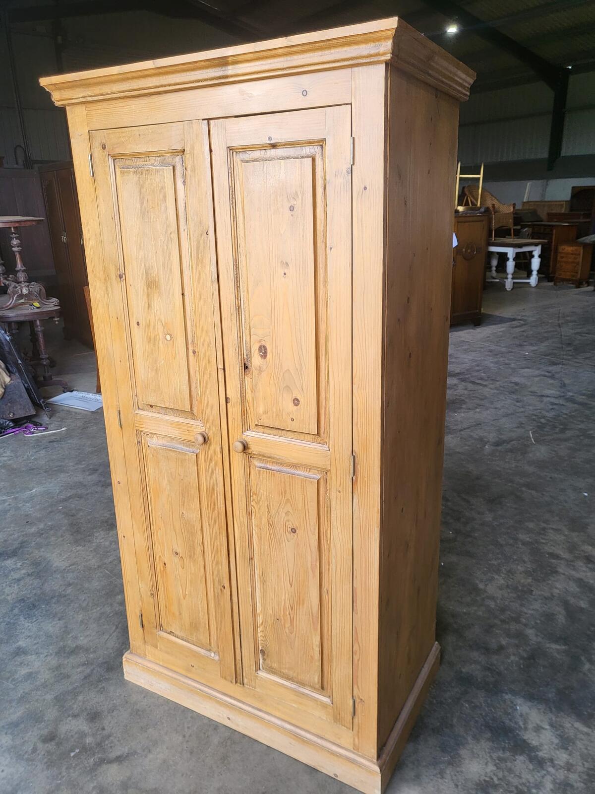 Pine panelled 2 door wardrobe hanging rail bedroom