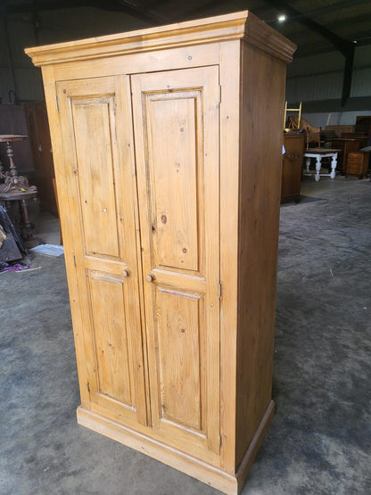 Pine panelled 2 door wardrobe hanging rail bedroom