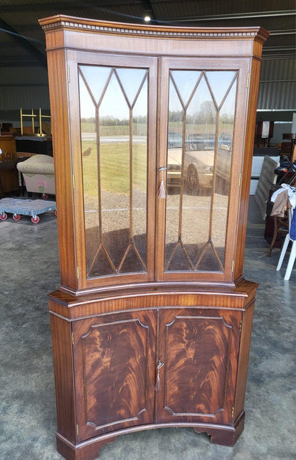 Antique repro large mahogany concave glazed corner cabinet