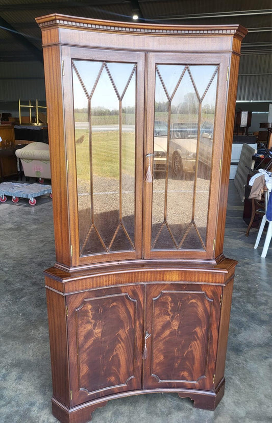 Antique repro large mahogany concave glazed corner cabinet