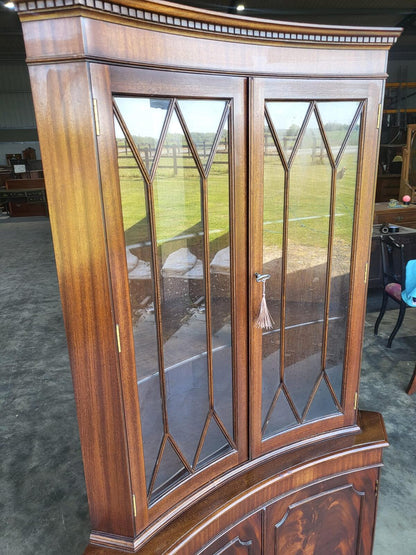 Antique repro large mahogany concave glazed corner cabinet