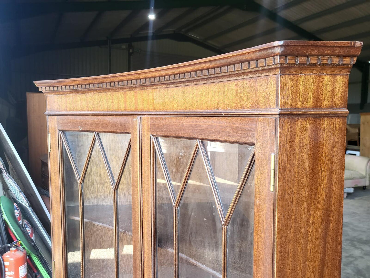 Antique repro large mahogany concave glazed corner cabinet