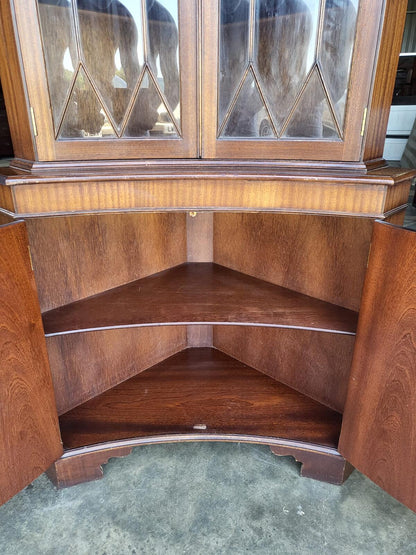 Antique repro large mahogany concave glazed corner cabinet