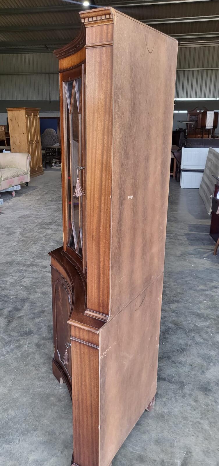 Antique repro large mahogany concave glazed corner cabinet