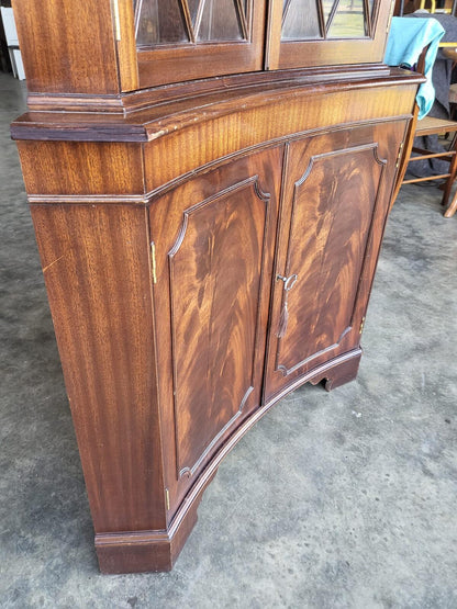 Antique repro large mahogany concave glazed corner cabinet