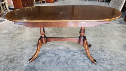 Twin pedestal extending D end dining table seat 8