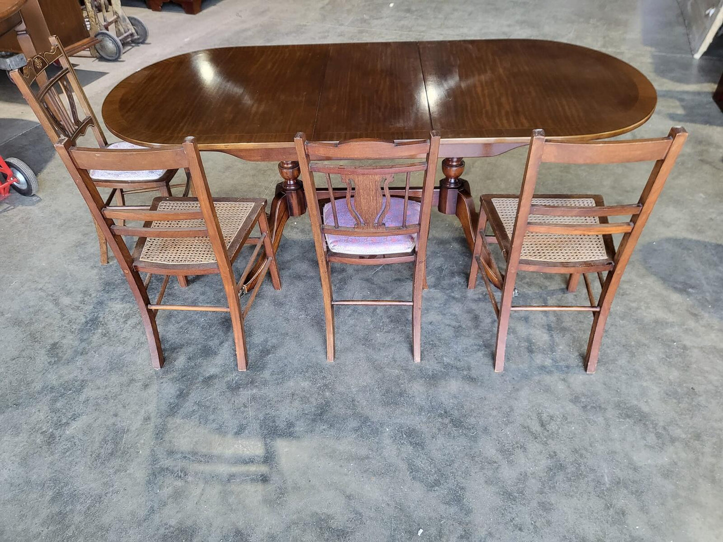 Twin pedestal extending D end dining table seat 8