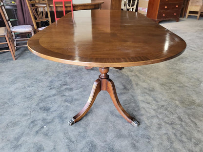 Twin pedestal extending D end dining table seat 8