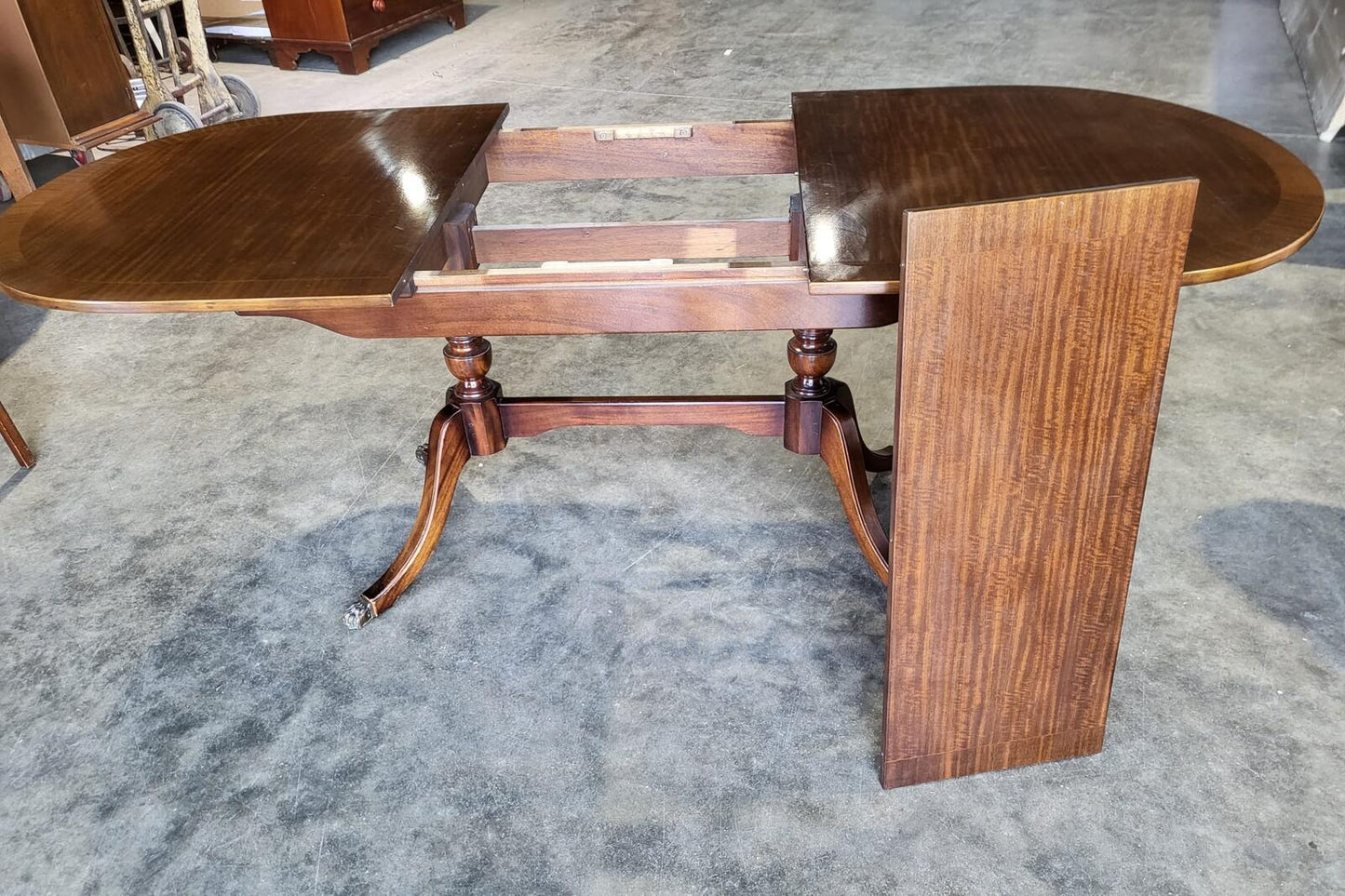 Twin pedestal extending D end dining table seat 8