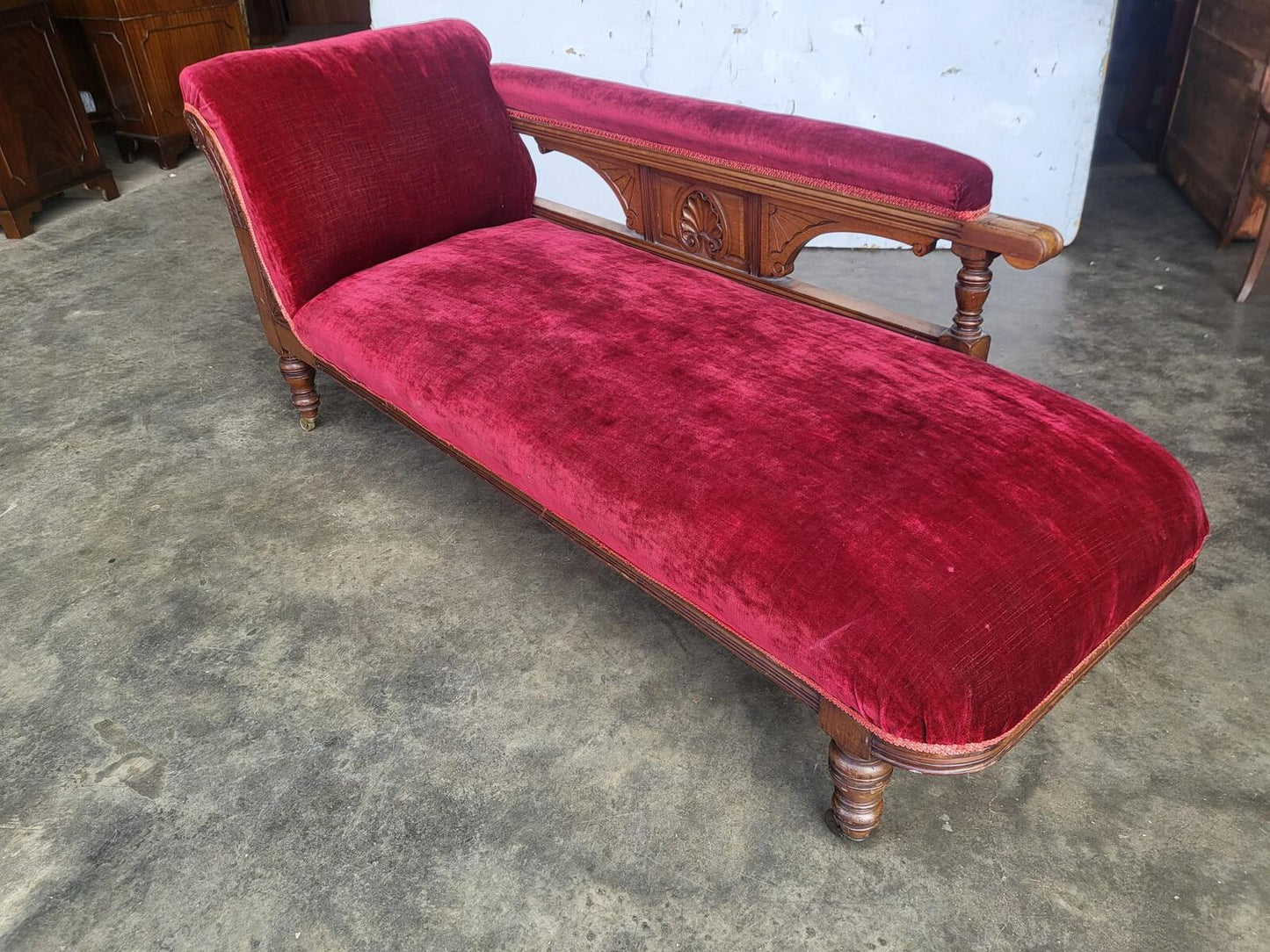 Antique Victorian red Chaise longue sofa turned legs castors
