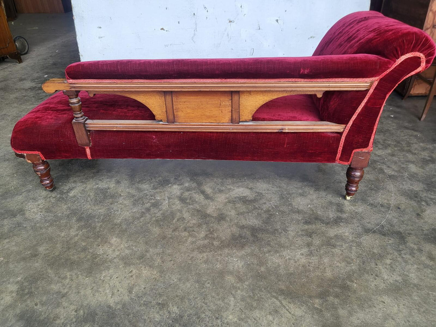 Antique Victorian red Chaise longue sofa turned legs castors