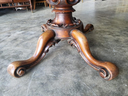 Antique Victorian walnut oval serpentine pedestal dining table