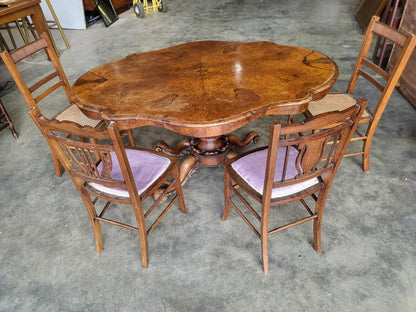 Antique Victorian walnut oval serpentine pedestal dining table