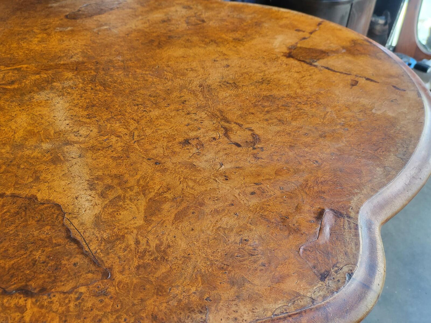 Antique Victorian walnut oval serpentine pedestal dining table