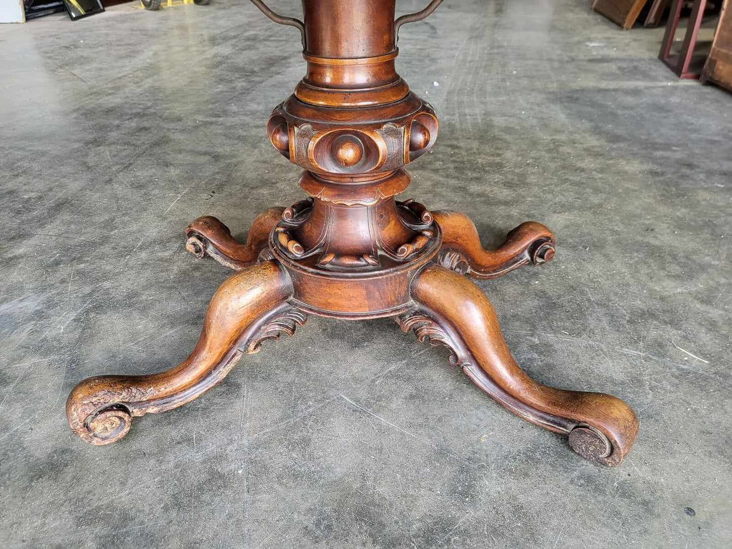 Antique Victorian walnut oval serpentine pedestal dining table